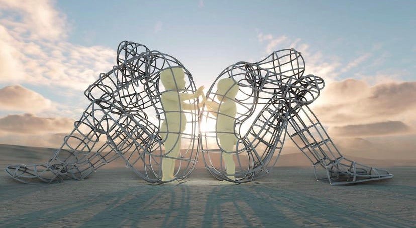 Sculpture of two adults with problems in their relationship, where the inner children reach out towards each other inside the adult bodies that sit facing away from each other